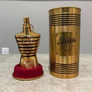 Jean Paul Gaultier Gold Striped Le Male Elixir Bottle